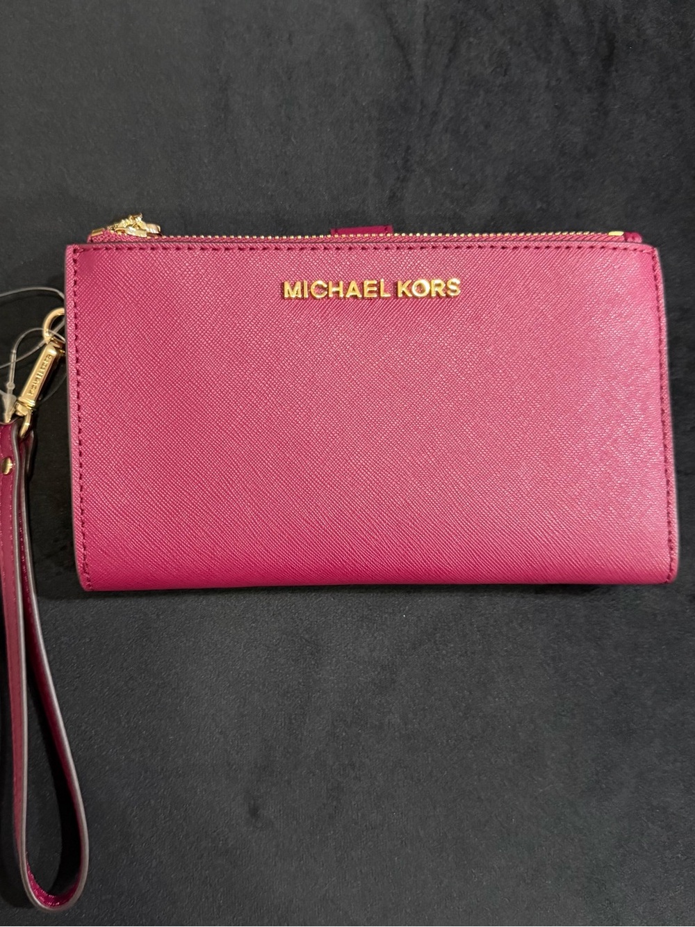 Michael Kors Travel Jet Large Wristlet in Magenta